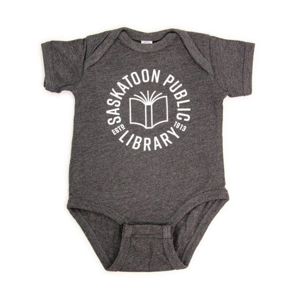 A light grey onesie with Saskatoon Public Library est. 1913 with a book drawing.