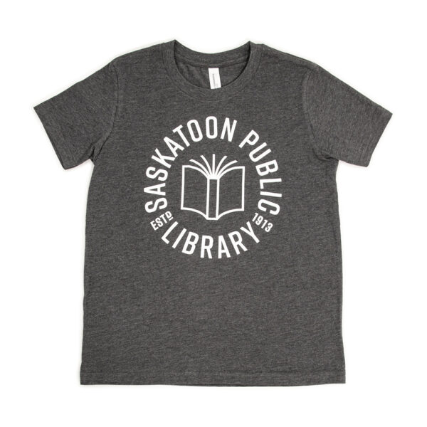A grey t-shirt with Saskatoon Public Library est. 1913 and an outline drawing of a book.