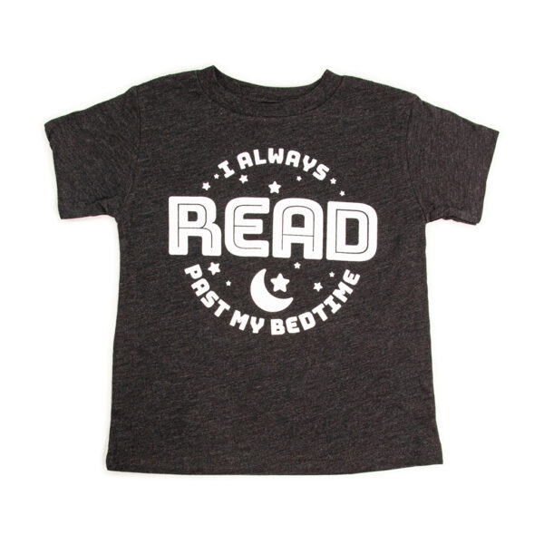 A grey t-shit with text that says, I read past my bedtime with moon and stars.