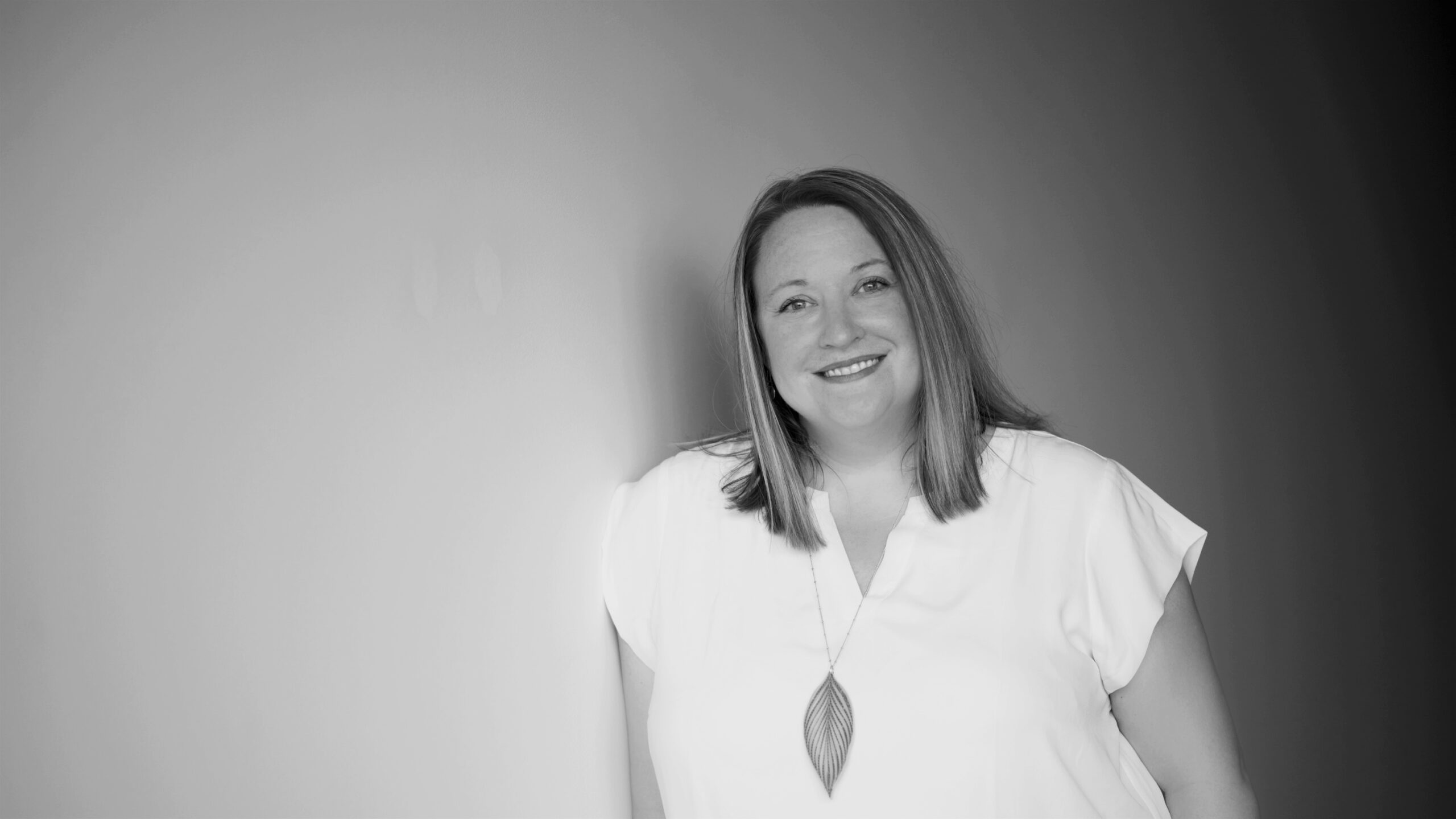 Black and white photo of the new writer in residence, Kristine Scarrow